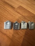 Four Zinc Knape & Vogt 256 Adjustable Steel Pilaster Shelf Support Clips - New. Fixed Price $9.93.