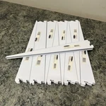 White Rubbermaid 14.5" Twin Track Shelving Bracket Set Of 10 FG4C0602. Fixed Price $44.99.
