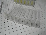 Two Cosmetics Retail Display 8 Slot Clear Pusher Shelf/shelving. Fixed Price $60.00.