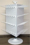 3 Sided Plastic White Counter Top Peg Board Spinner Rack Display With Hooks. Fixed Price $53.95.
