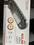 Solar 810 Lumen Dark Grey 2-IN-1 Outdoor Motion Activated Security Area Wall And. Fixed Price $85.00.