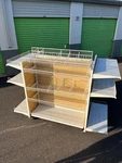 Store Shelving Unit/ Display 4 Casters With Locks Rotates 360 Degrees. Fixed Price $320.00.