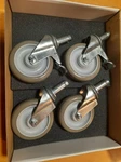 Set Of Nexel Casters 5X1 1/4" Quiet Ride Poly Swivel Wheels CA5R4. Fixed Price $69.00.