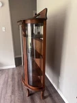 Antique Empire Oak Curved Bow-front Glass Curio Display Cabinet Paw Feet And Car. Fixed Price $600.00.