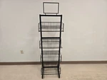 2 Sided Metal Display Rack With 8 Wire Basket Shelves And Headerboard. Fixed Price $49.99.