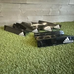 Acrylic Adidas Slat Wall Shelf Pieces. Fixed Price $80.00.