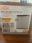 Hdx Stackable Utility Cabinet Gray Plastic Shelves 26.9X33.7X15.7. Fixed Price $60.00.
